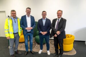 Beim Rundgang durch die neuen Büroflächen an der Nordstraße (v.l.): Andreas Hennig, Thomas Terhorst, Marco Rebohm und Dr. Manfred Gehrke verschafften sich gemeinsam einen Eindruck von den modern gestalteten Räumen. Foto: Stadt Marl / Pressestelle.
